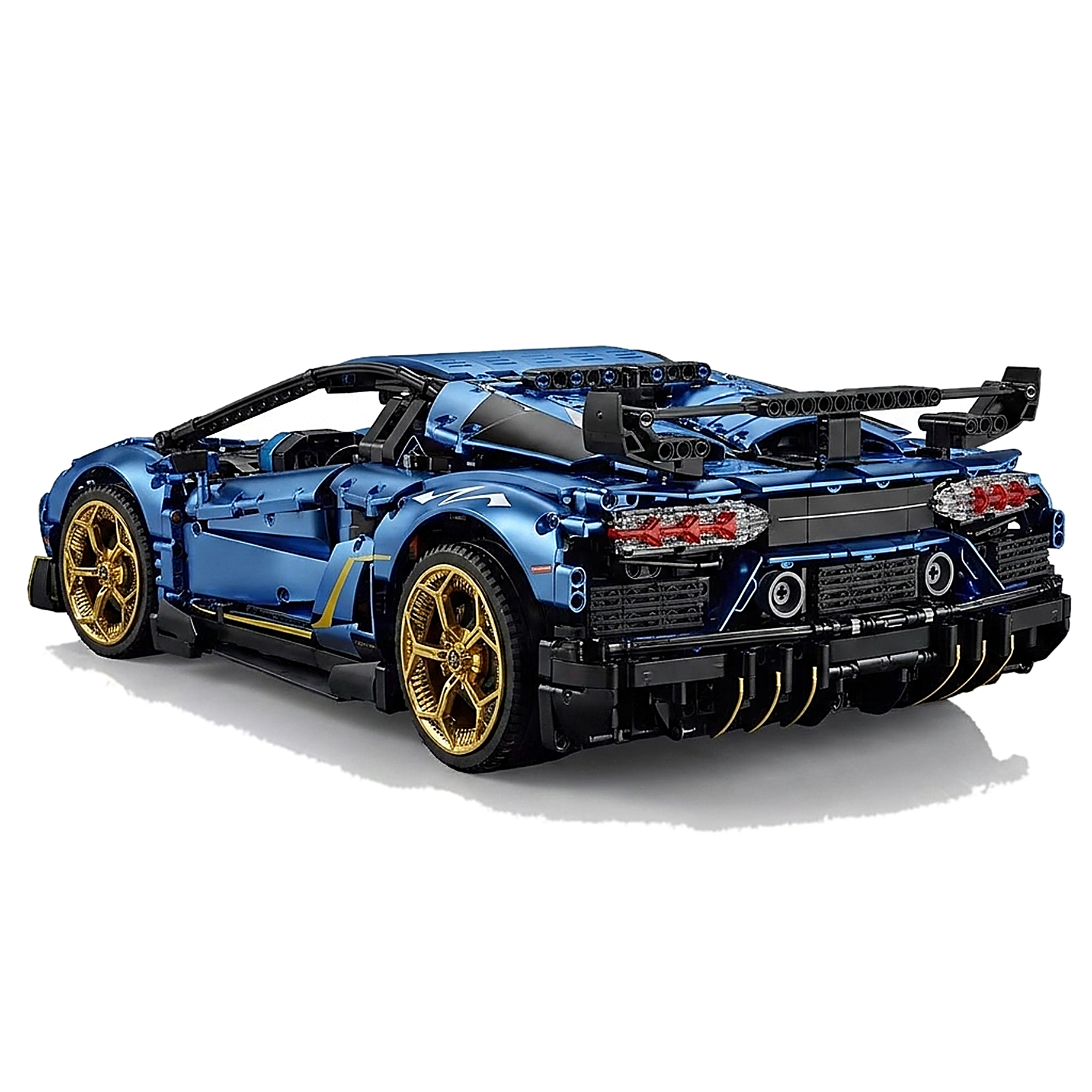 Rear three-quarter studio view with wing and diffuser