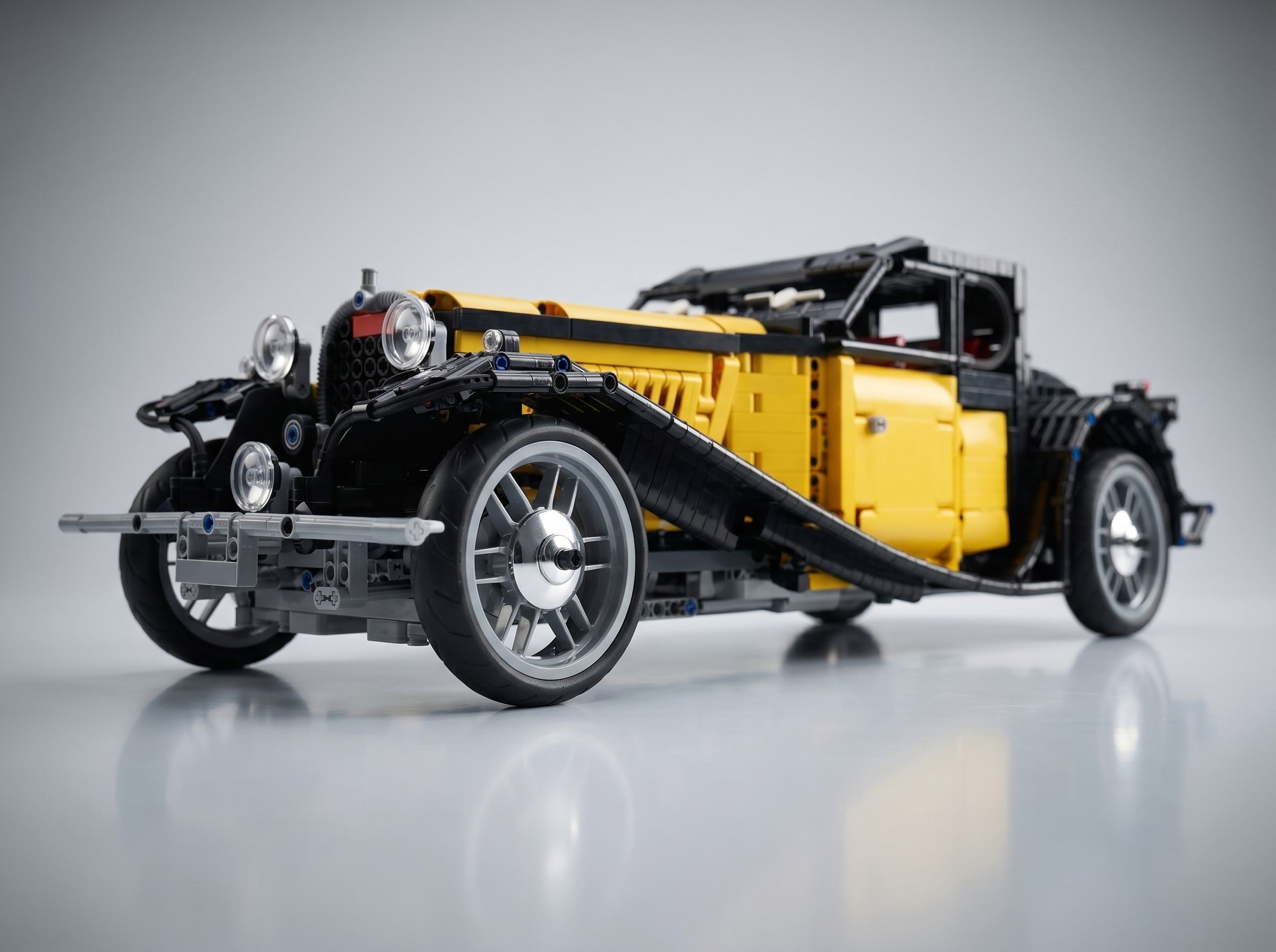 1930s French Grand Tourer brick model side view, custom vintage spoked wheels and flowing fenders