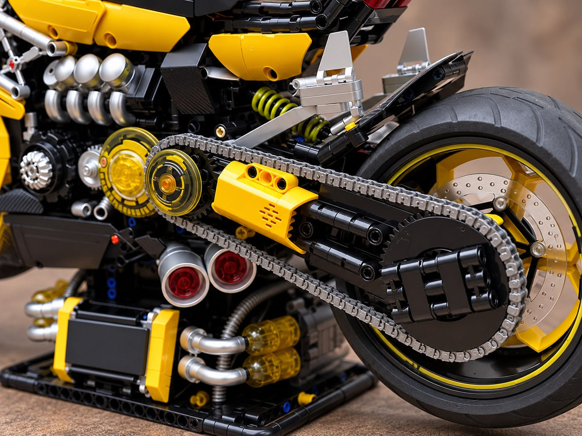 Close-up of the chain, sprockets and wide rear tyre