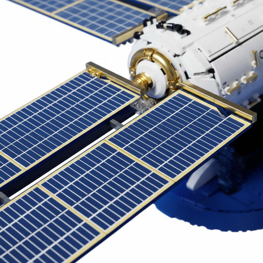 Two flexible solar arrays spread out from the station